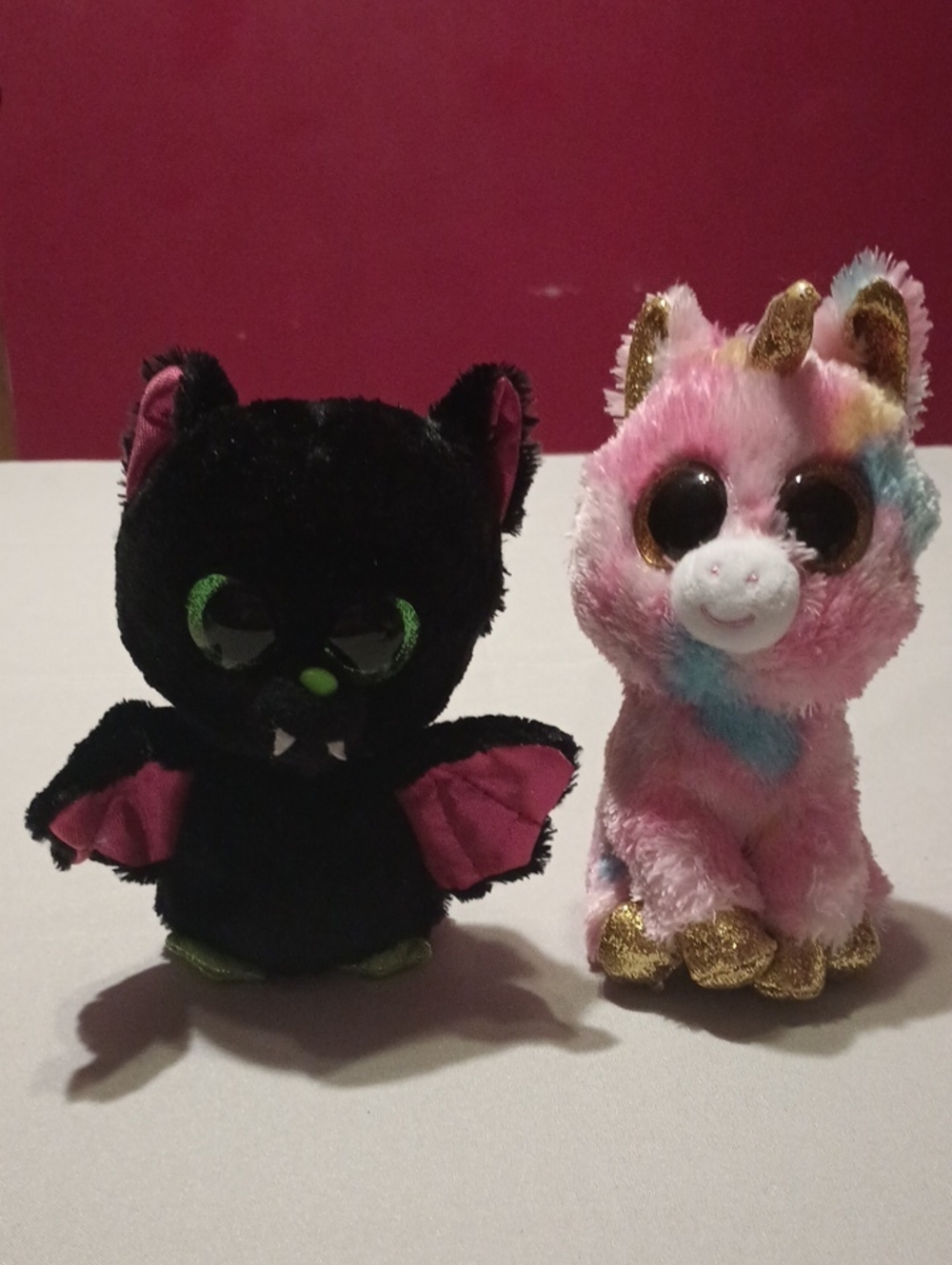 Bundle Of 2 Plushies, A Pink Multicolor Unicorn & Black Bat Plush Pair